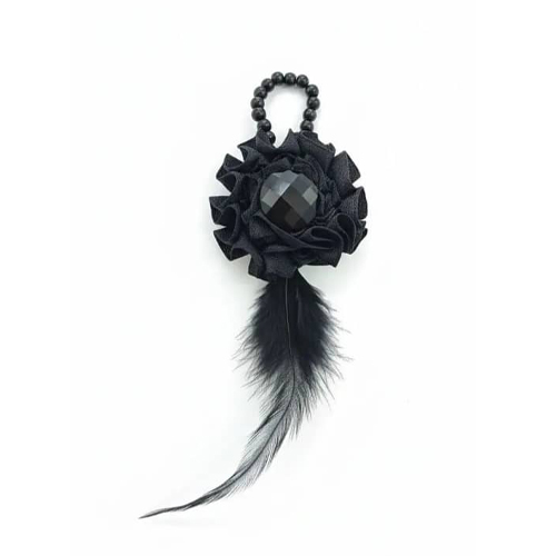 گل سینه طرح گل و پر